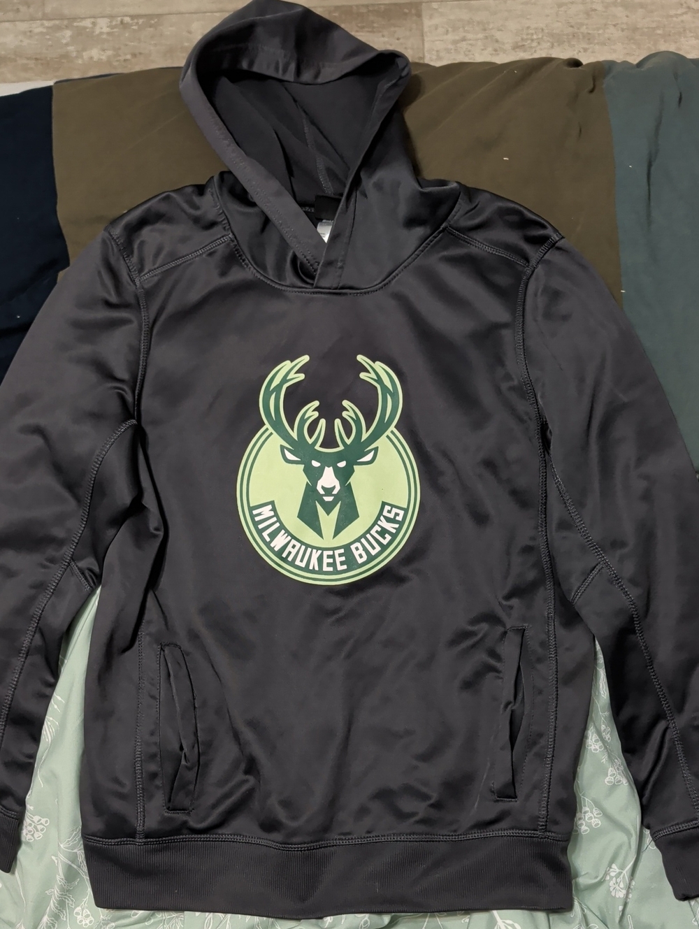 NBA Milwaukee Bucks Black Hooded Raincoat with Green Logo